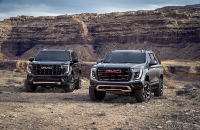 Pack view of the 2025 GMC Yukon, including the AT4 Ultimate (right) and Denali Ultimate (left).